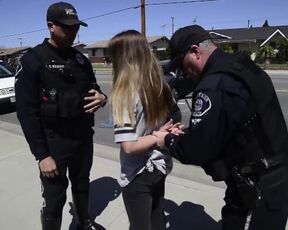 Girl has to Interlace Fingers before Handcuffing