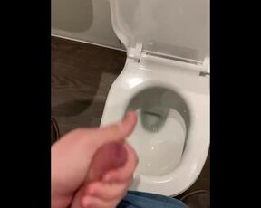 Wanking off in public cubicle with big cumshot at the end