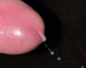 SLOW MOTION close up cumshot and foreskin pulling back and forth