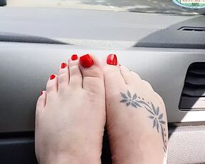 feet in the car