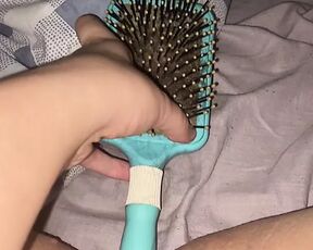 Pup303 with a hairbrush anal