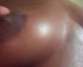 Ebony soapy breast massage