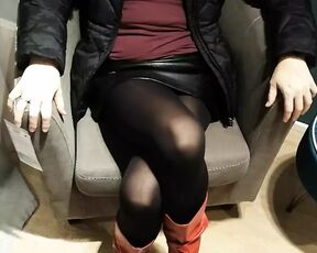 Fully dressed crossed legs orgasm in a store