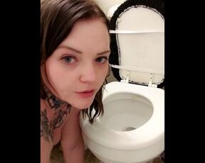 Licking toilet seat